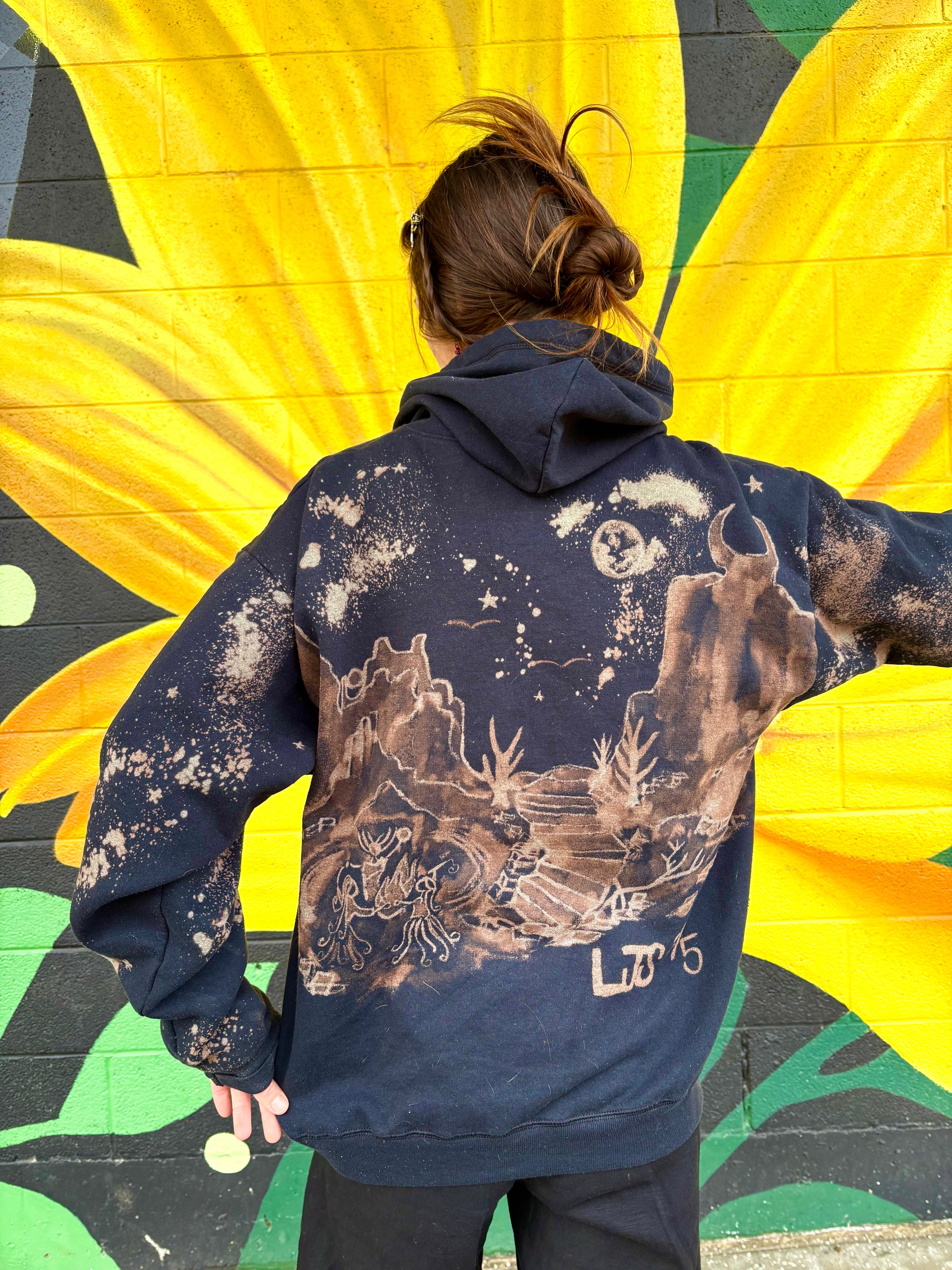 Black zip up hand- painted bleach art the back based off garden of the gods has three people doing a ritual under the stars and full moon surrounded by the mountains 