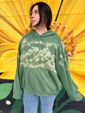 Green hoodie hand painted bleach art of a mountain under the stars and moon 