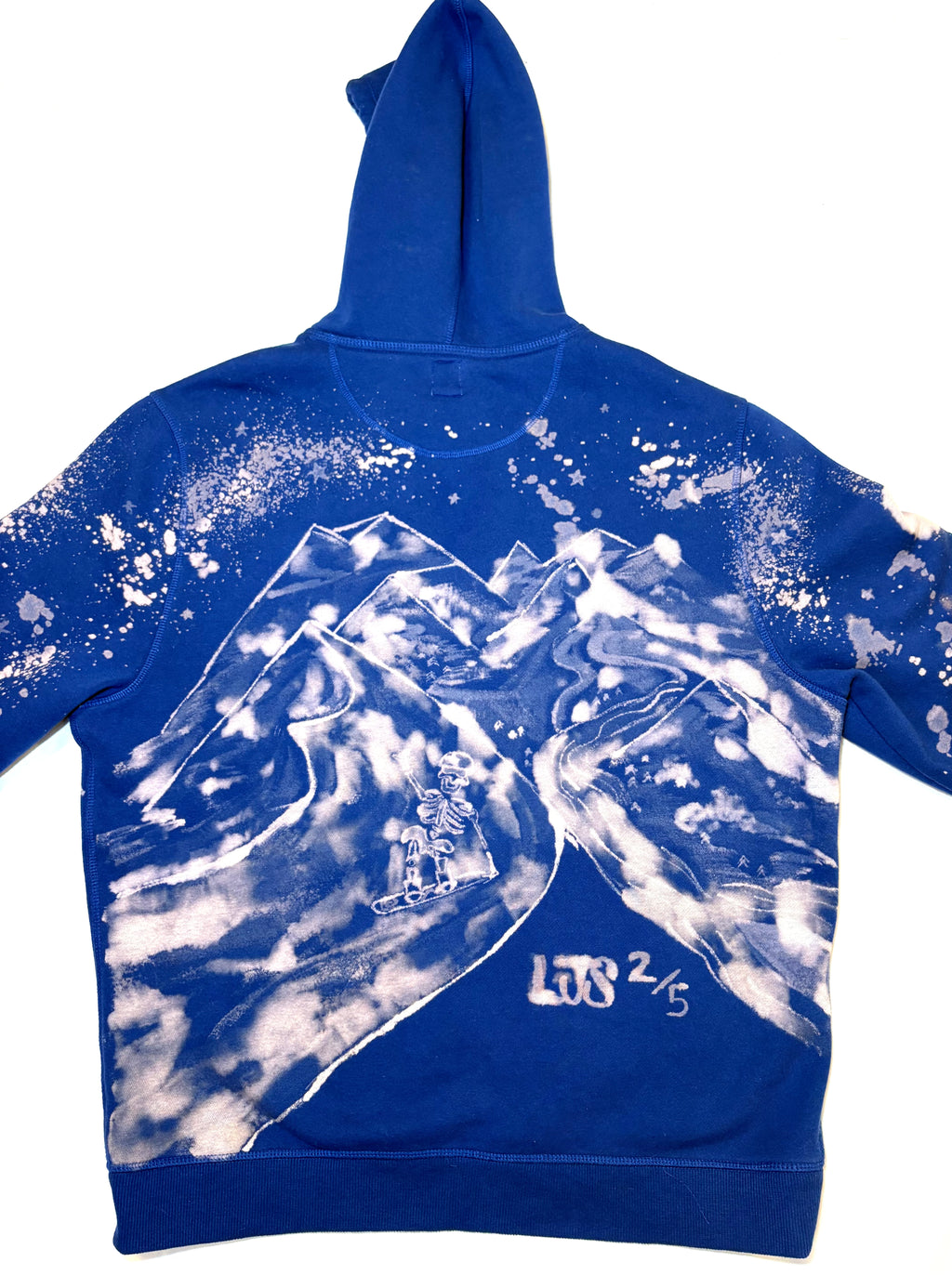 blue hand painted bleach art skeleton snowboard hitting a big jump 