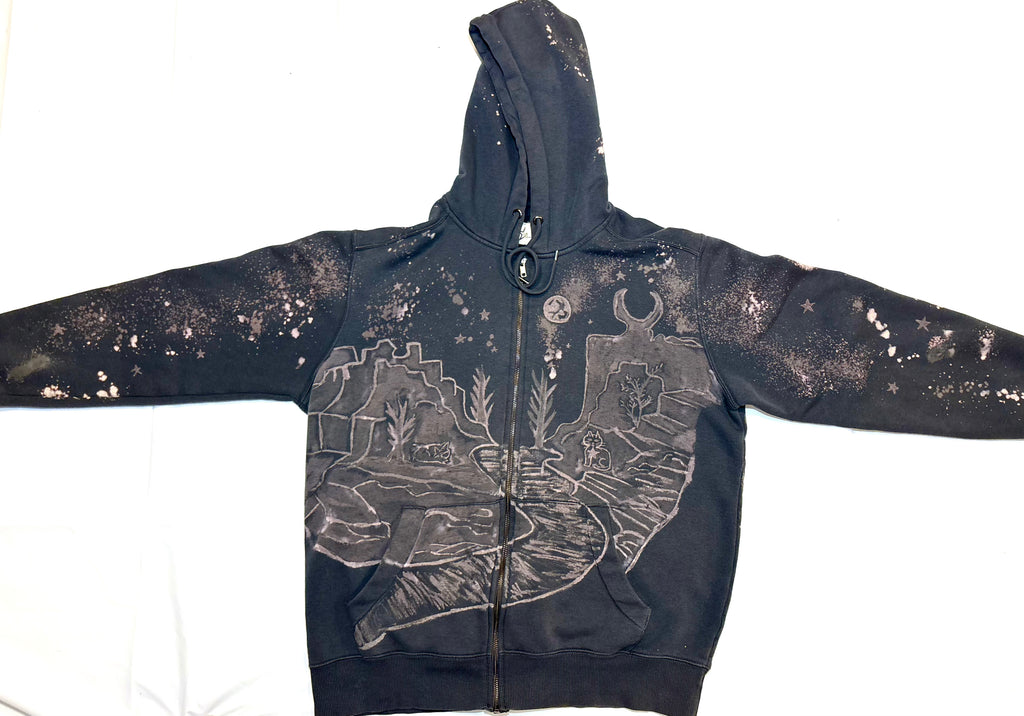 hand painted bleach art based off garden of the gods two cats are protecting the entrance 