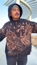 hand painted zip up hoodie of the garden of the gods two cats are in front protecting the entrance 