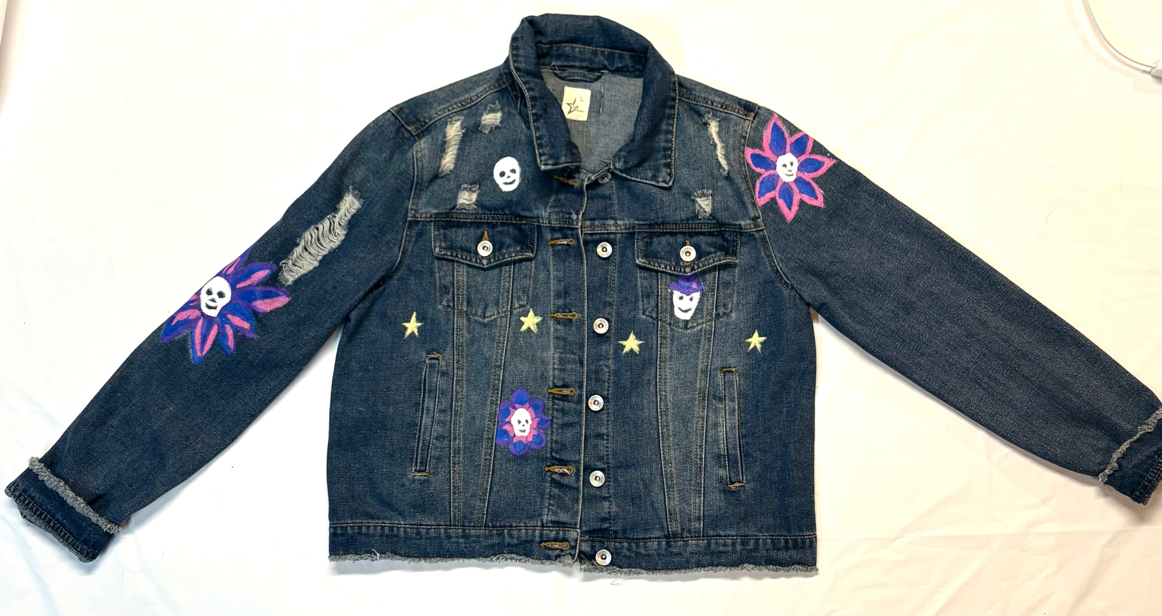 Denim jacket with colorful patches of Skeleton heads of flowers and cowboy hats hand painted