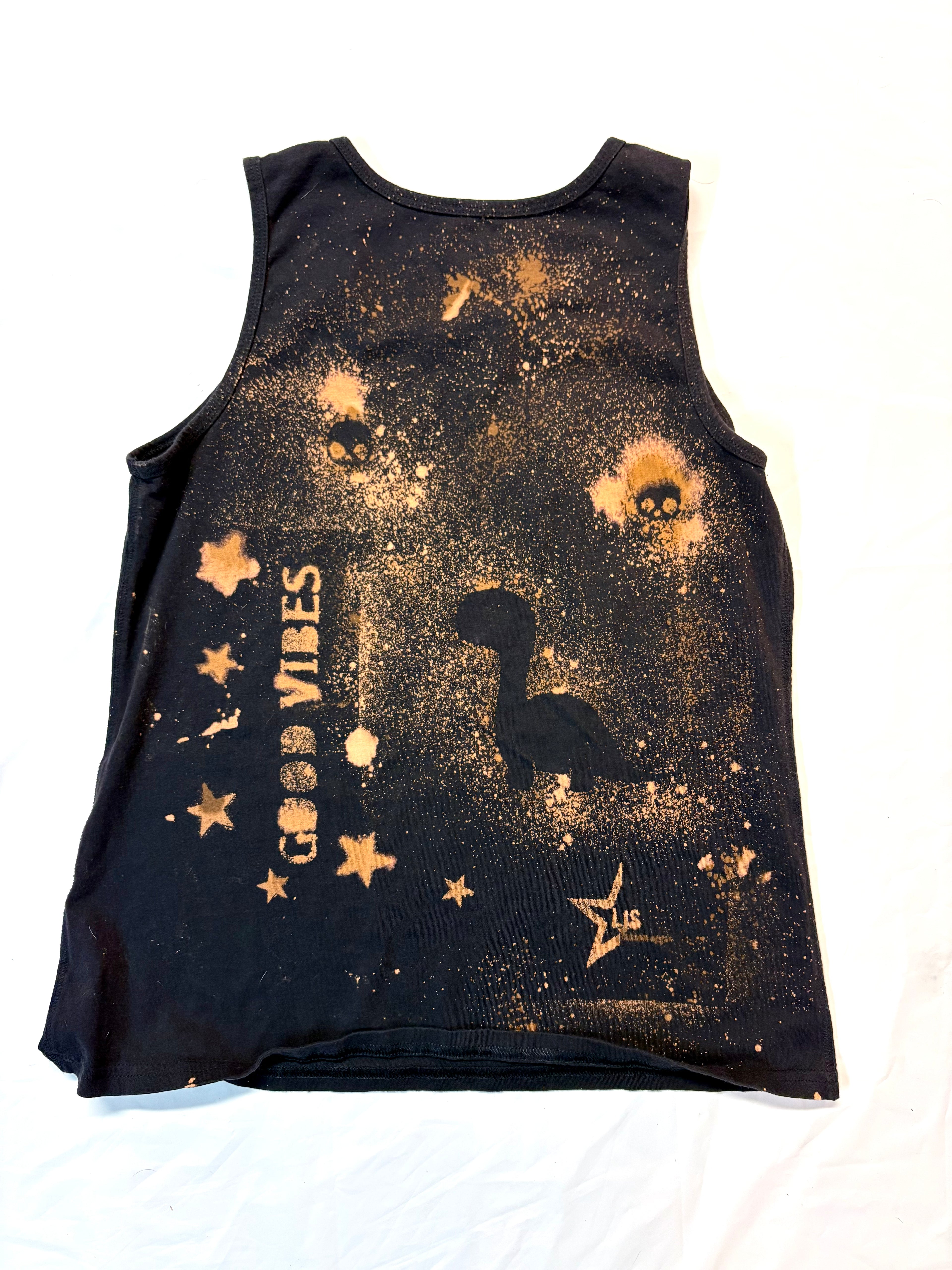 back of black tank top bleach dyed with a Dinosaur on it good vibes and skulls and stars bleach dye 