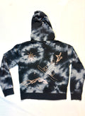 tie dye hoodie with snowboard hitting a jump 