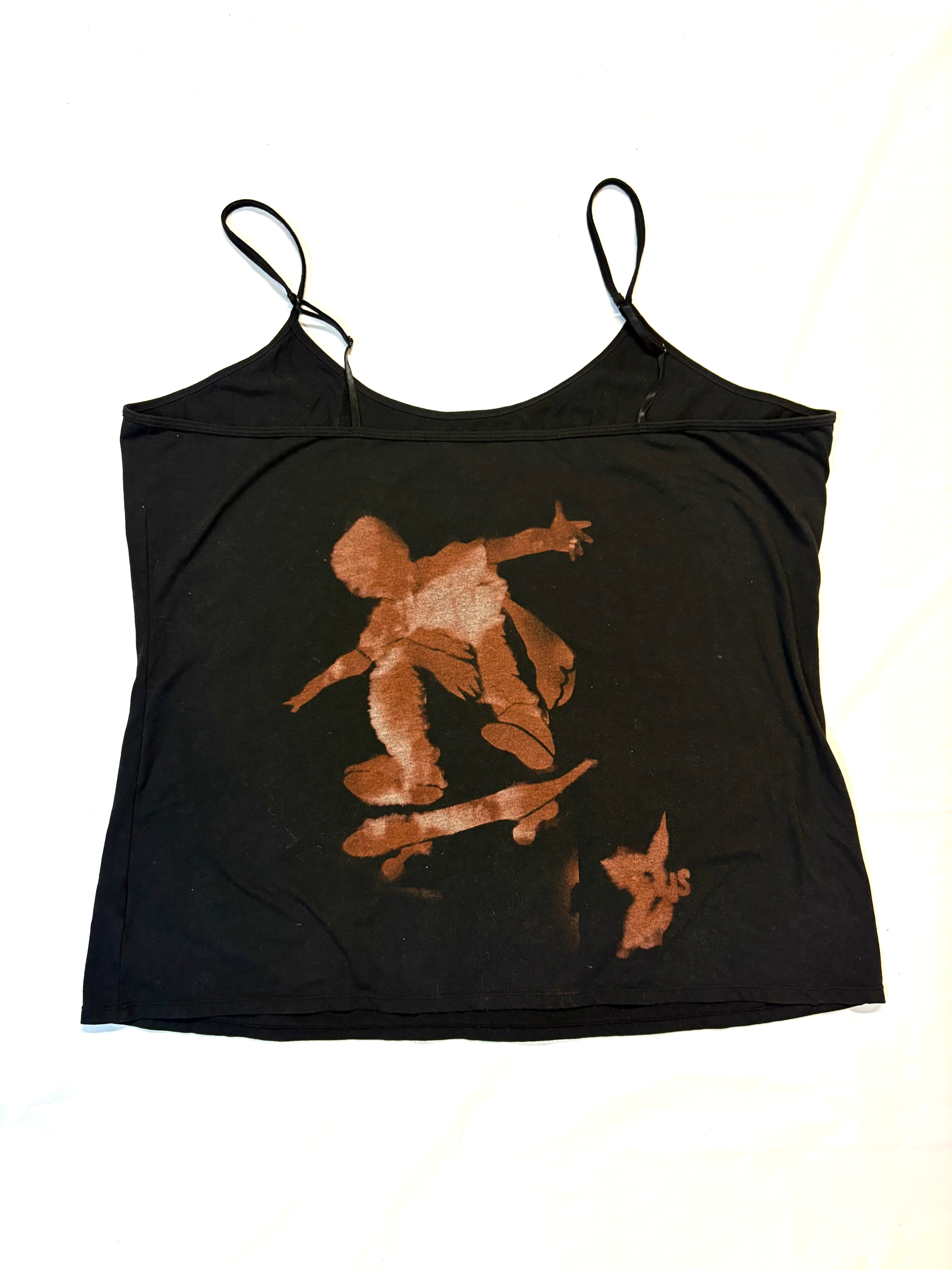 Black tank top with skater doing a trick