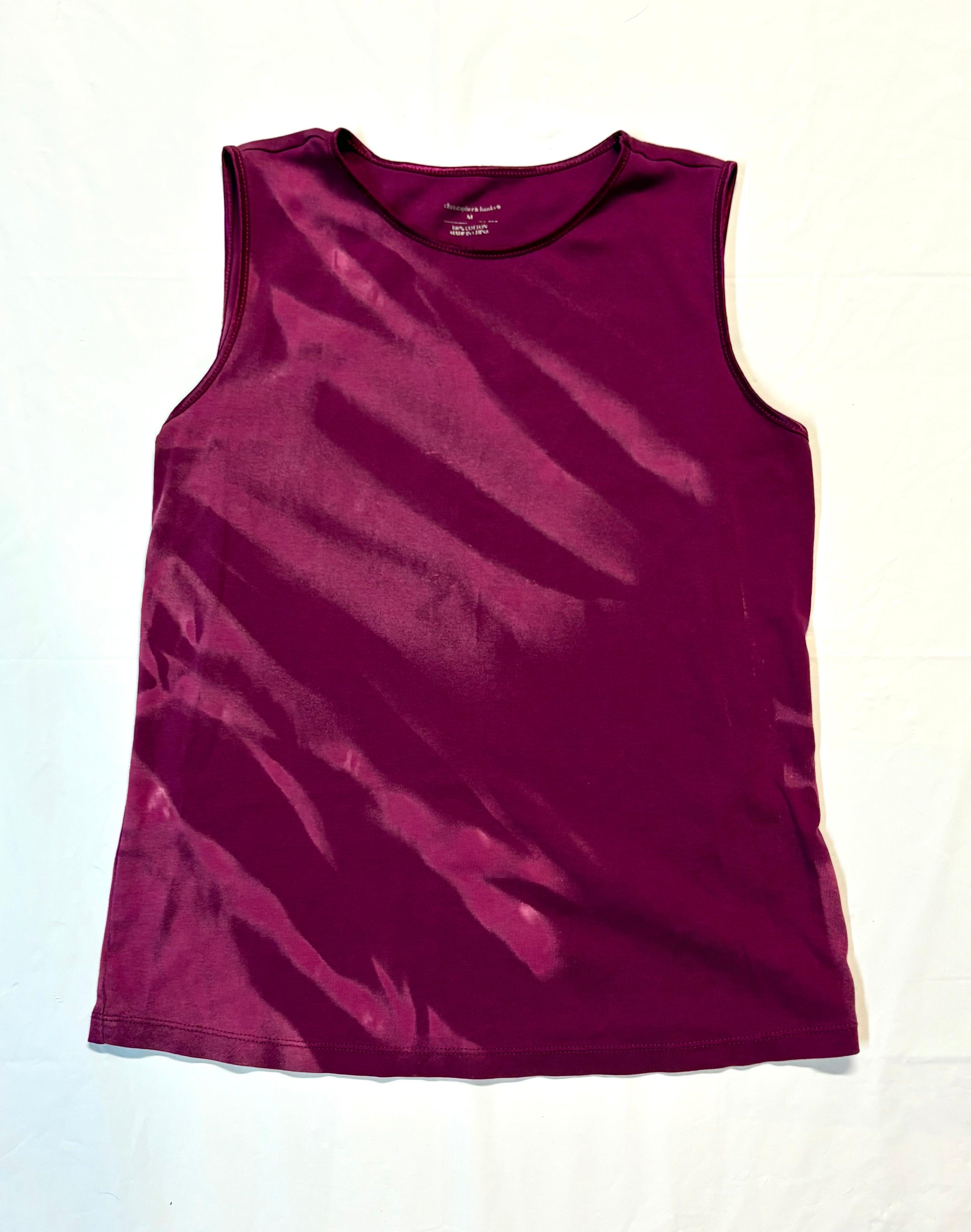 Purple tank top on a white background