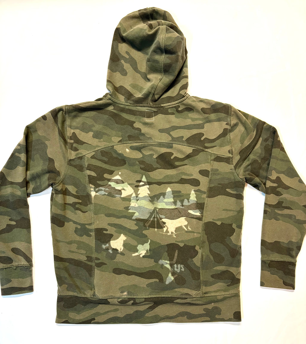 Camouflage hoodie with a nature-themed graphic camping on a camo background