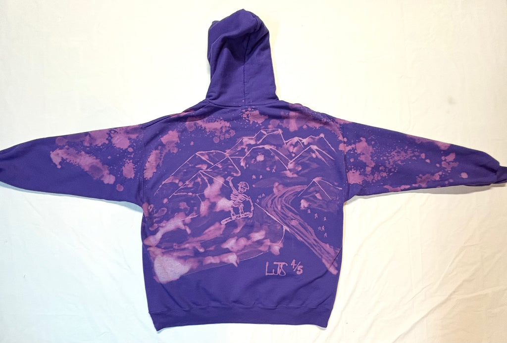 purple bleach art hoodie with snowboarder hitting a jump 